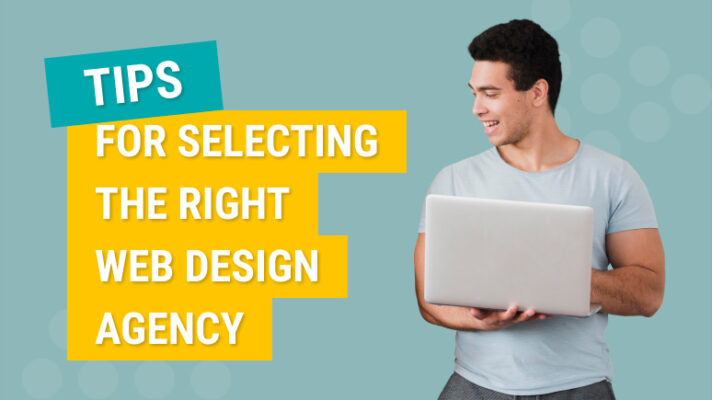 Tips for selecting the right web design agency with a man holding a laptop